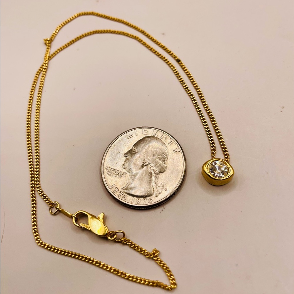 Dainty gold plated choker necklace with a cubic zirconia oval shaped pendant. - Picture 6 of 6